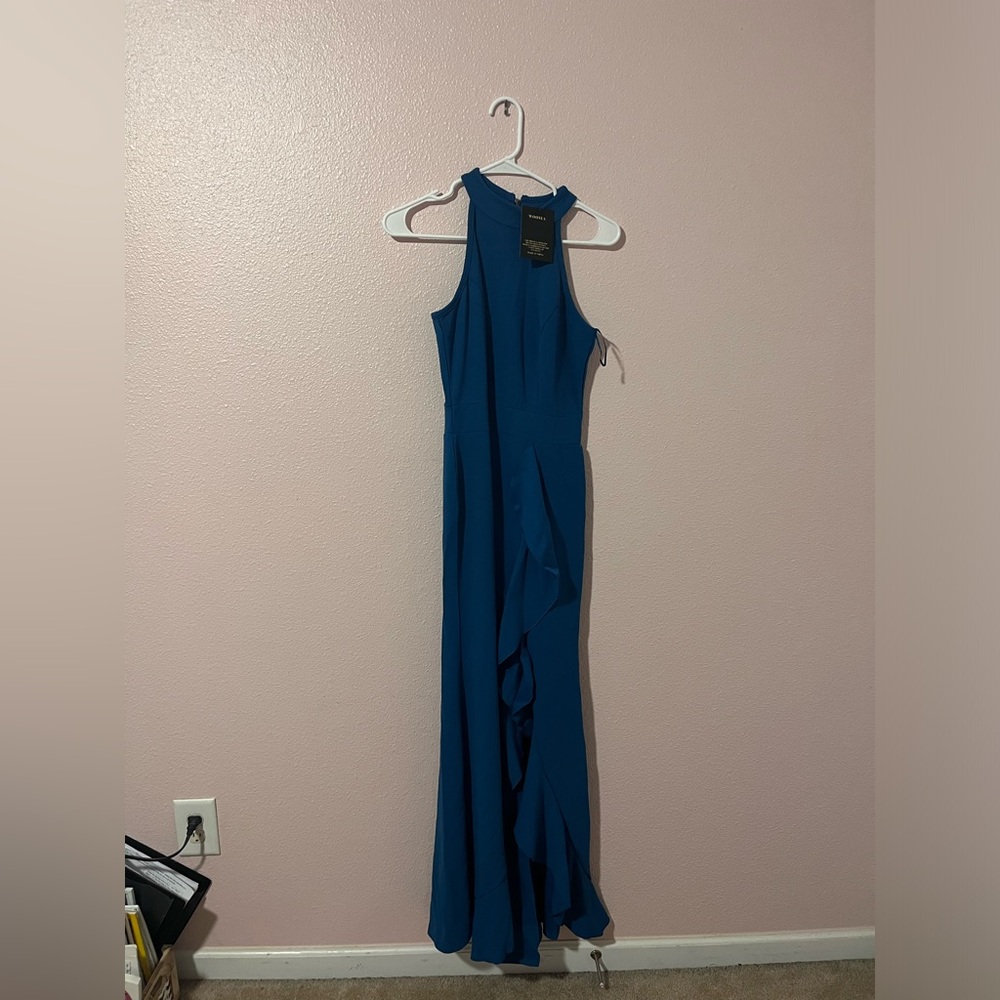 hello! i’m selling this beautiful teal elegant party dress from Woosea!